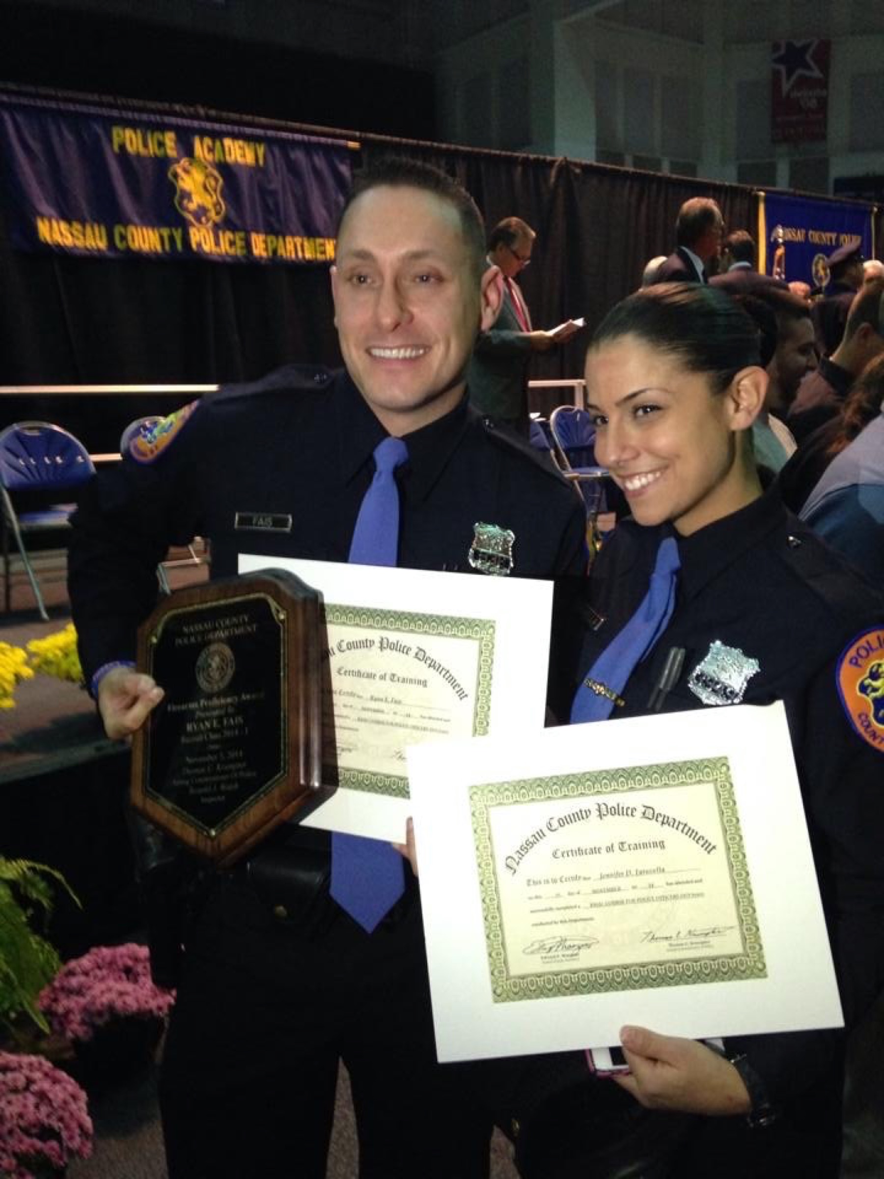 Both in NCPD blues with certificates.